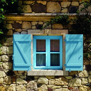 close up retro style old house window of Mediterranean architectural culture in Alacati town of Izmir, Turkey